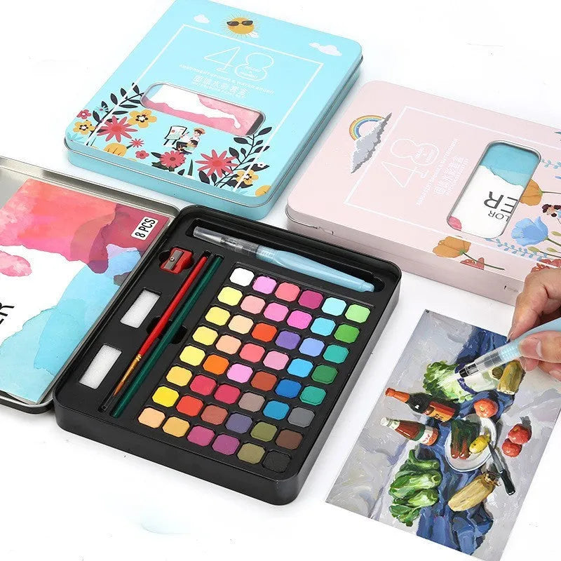 48 colour solid watercolour paint set in box showing Black Knight, Girl Pink and Sunshine Blue pans