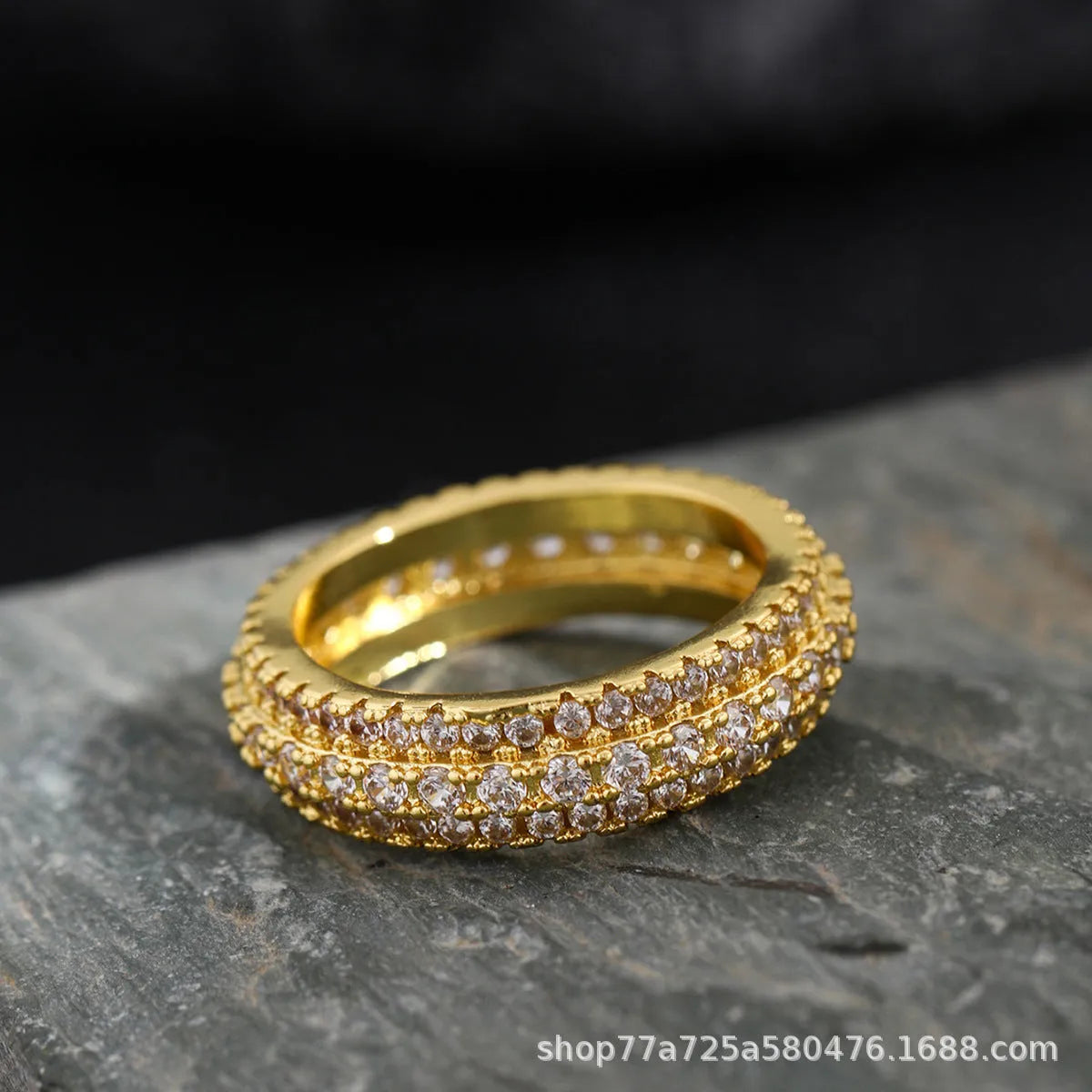 Geometric triangle copper engagement ring with a zircon stone inlay.