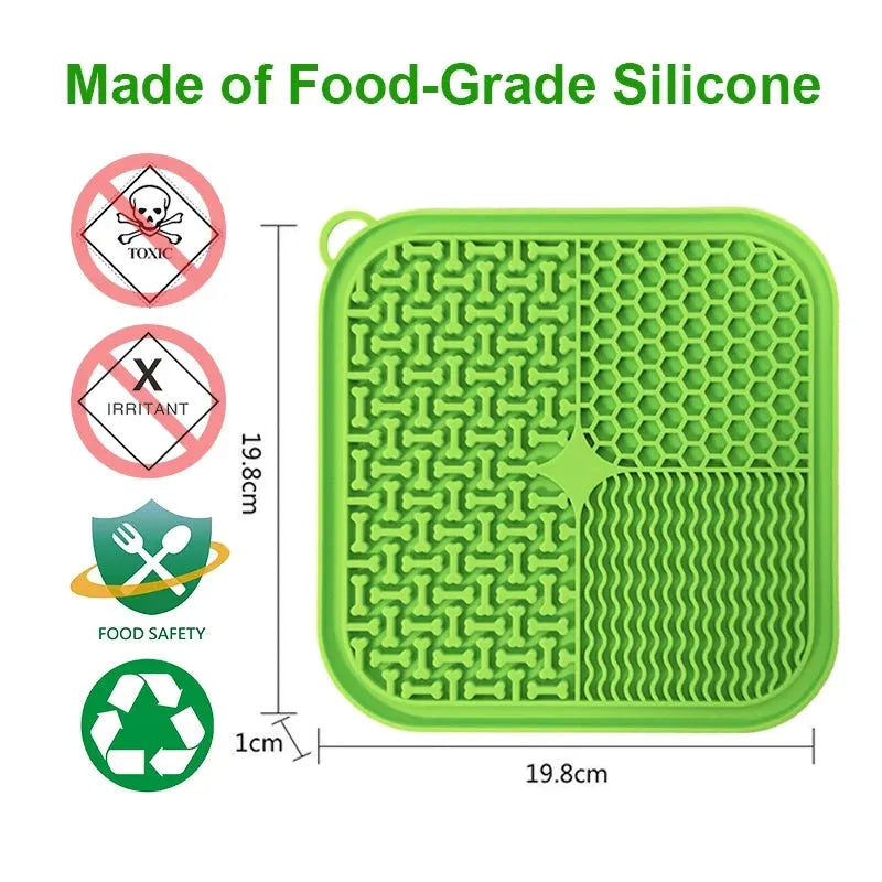 Blue silicone dog licking mat with textured surface and suction cups on back for slow feeding and anxiety relief