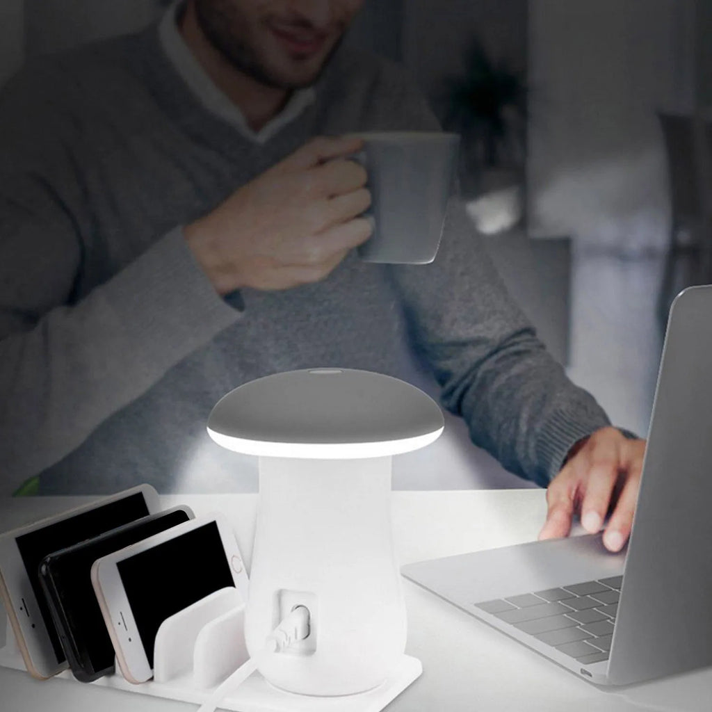 White Besegad mushroom-shaped USB charging dock station with five ports and integrated LED desk lamp.