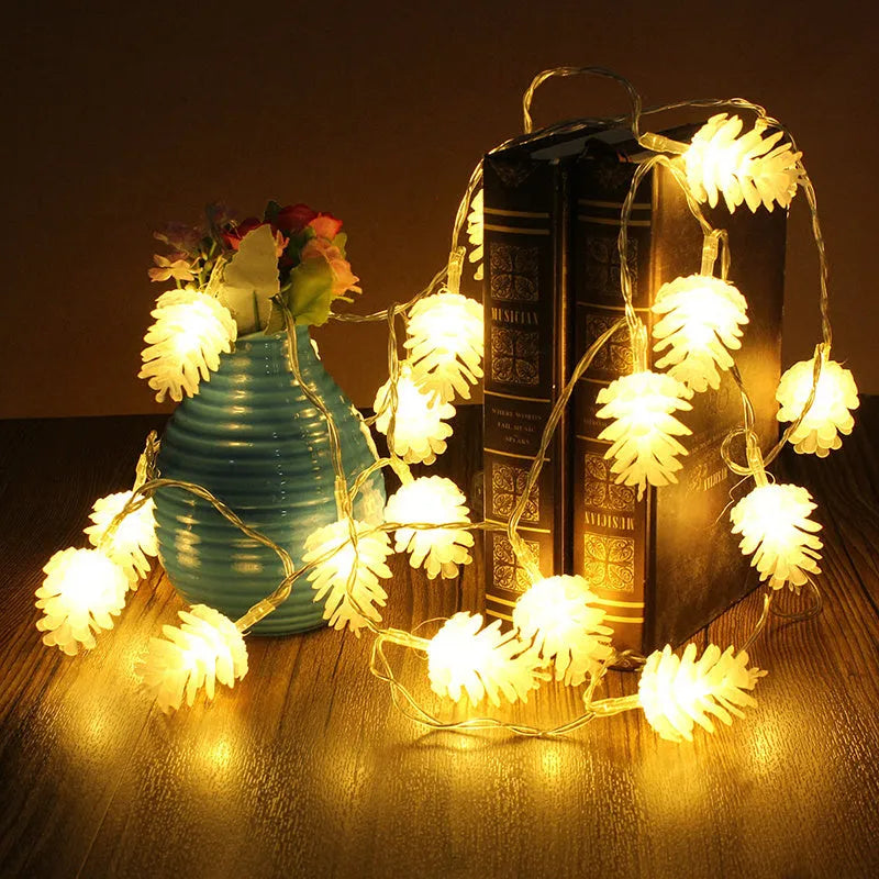 Warm white LED pine cone decorative light string powered by AA batteries