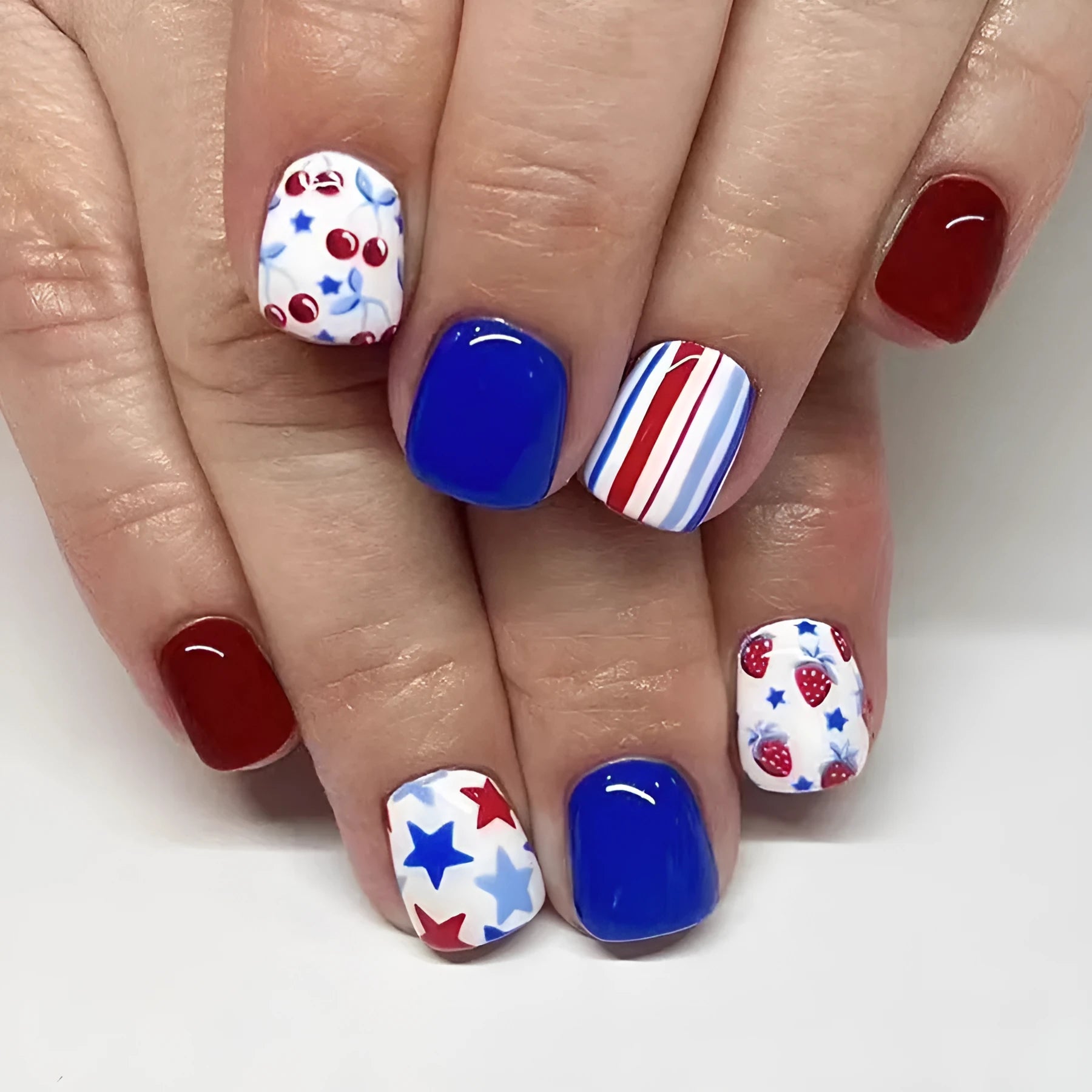 Short glossy red and blue strawberry cherry nail stickers for independence day manicure 24 pieces