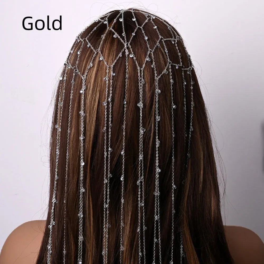 Gold and silver rhinestone mesh hair band with a tassel detail