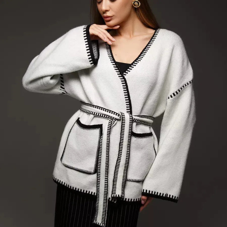 Loose fit knitted cardigan with lace-up front detail in thick imitation cashmere cotton fabric.