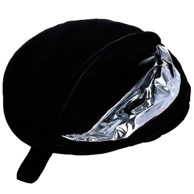 Collapsible 5-in-1 photography reflector with gold, silver, white, black, and translucent surfaces folded with carrying bag