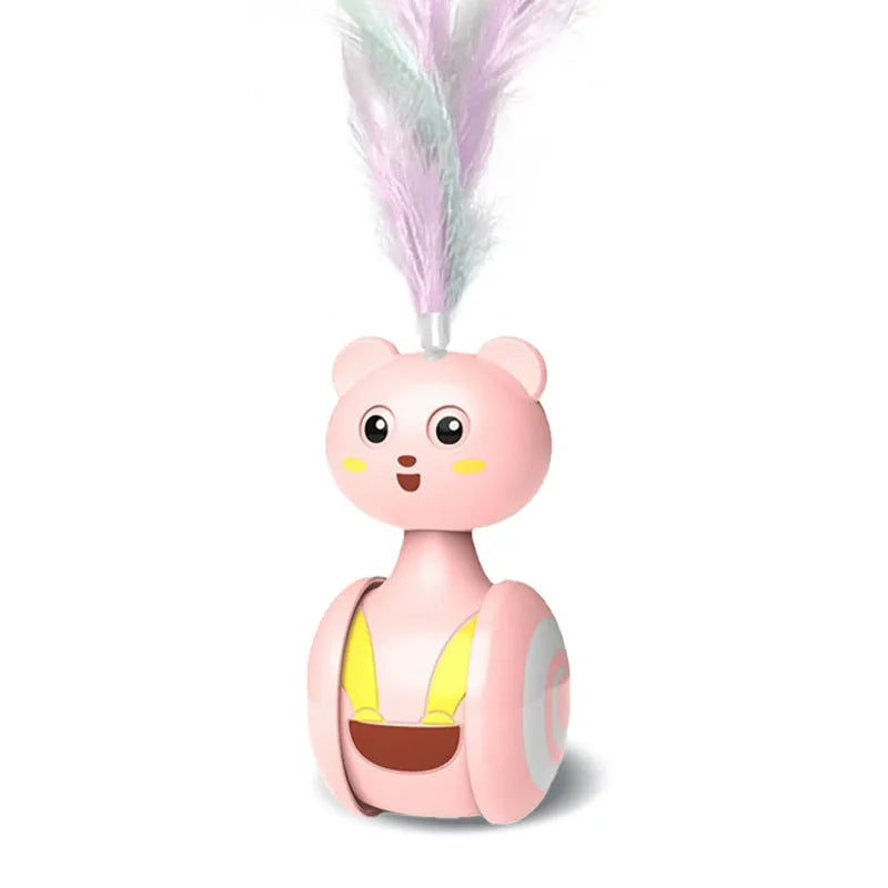 Pink and blue cat interactive toy with feather wand and rolling ball on wooden floor