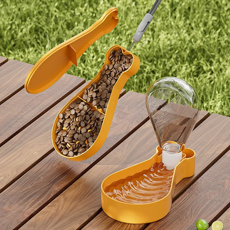 Orange and white portable pet water feeder showing water bottle and food container compartments with carrying sling