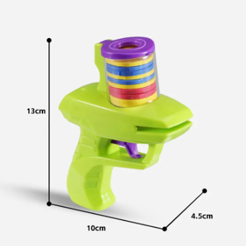 Green interactive cat toy launcher with three foam discs for battery-free feline play