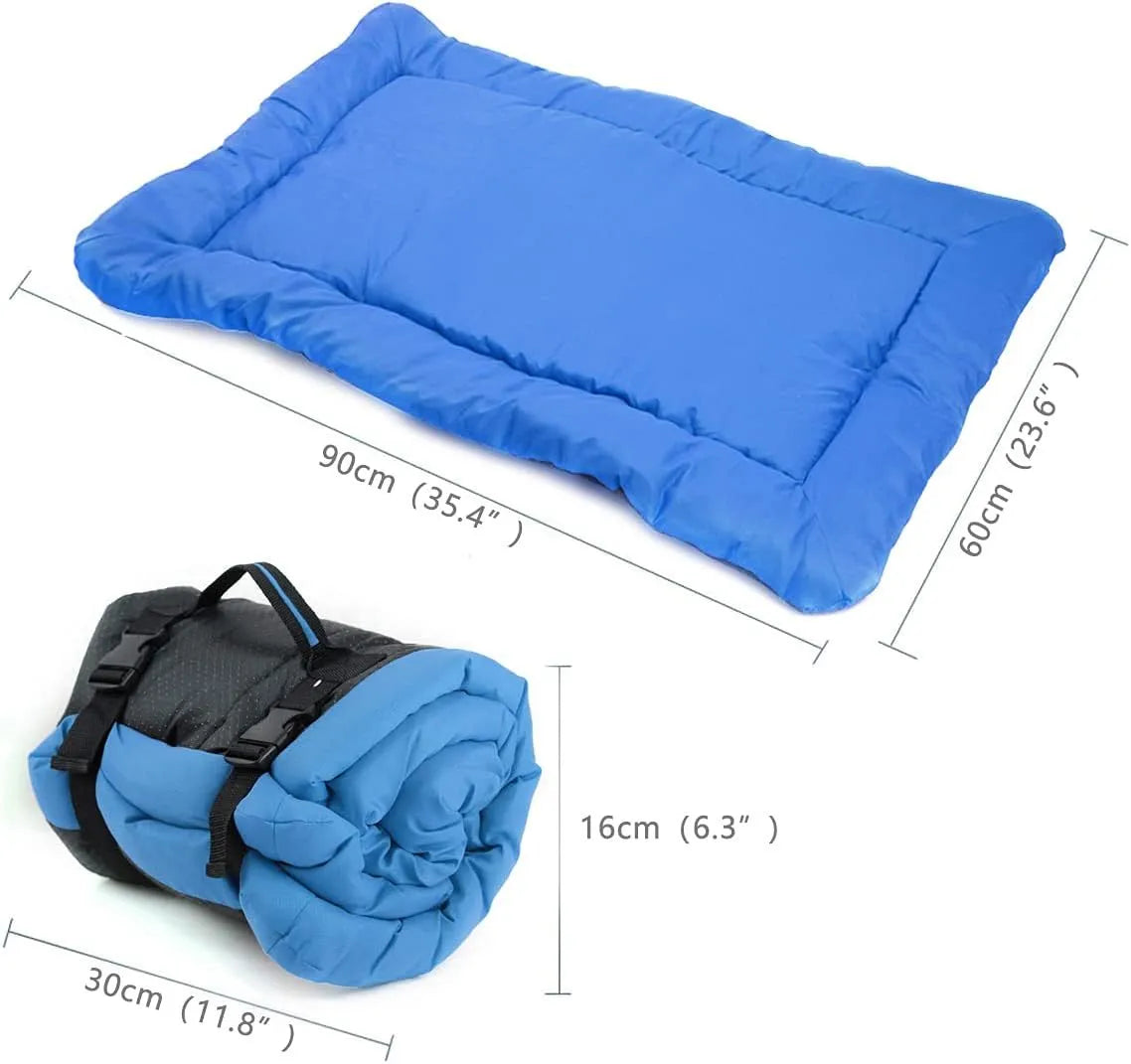 Blue foldable outdoor dog bed showing folded size next to unfolded mat on grass