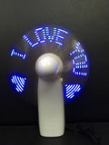 White handheld mini fan showing blue and red LED lights forming a heart and 'I love you' message.