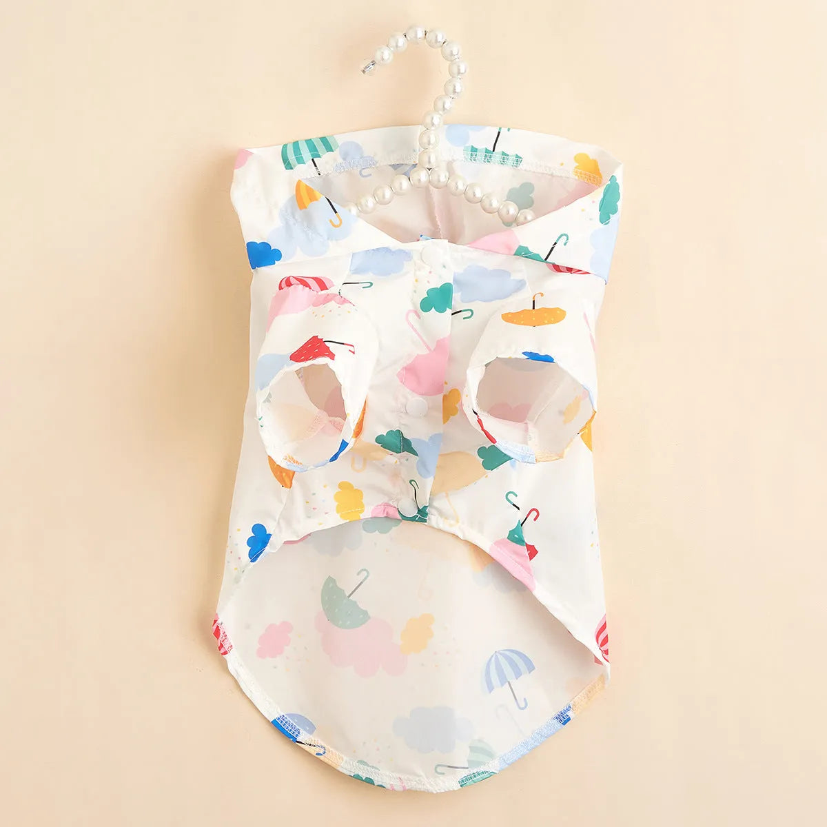Cartoon umbrella pattern dog raincoat in polyester fabric showing colourful design