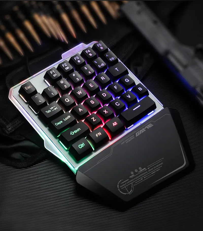 Black G40 Flow Colour one-handed mechanical gaming keyboard with RGB backlit keys on a desk