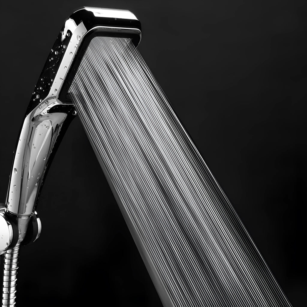 Orange hand-held pressurised shower with 60mm rain spray face