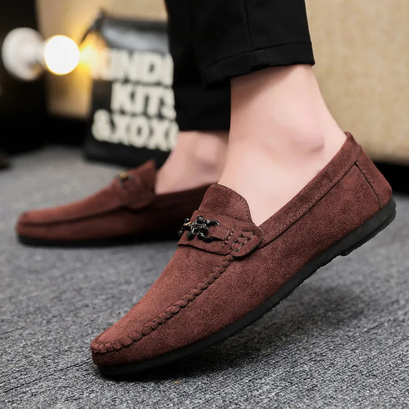 Men's waterproof slip-on loafers in artificial PU leather with rubber soles, available in black and brown colours