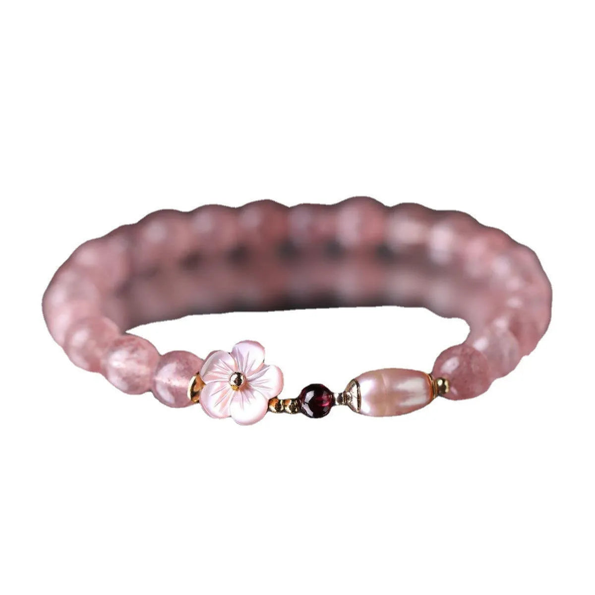 Crystal floral bracelet with strawberry quartz peach blossom colour on wrist