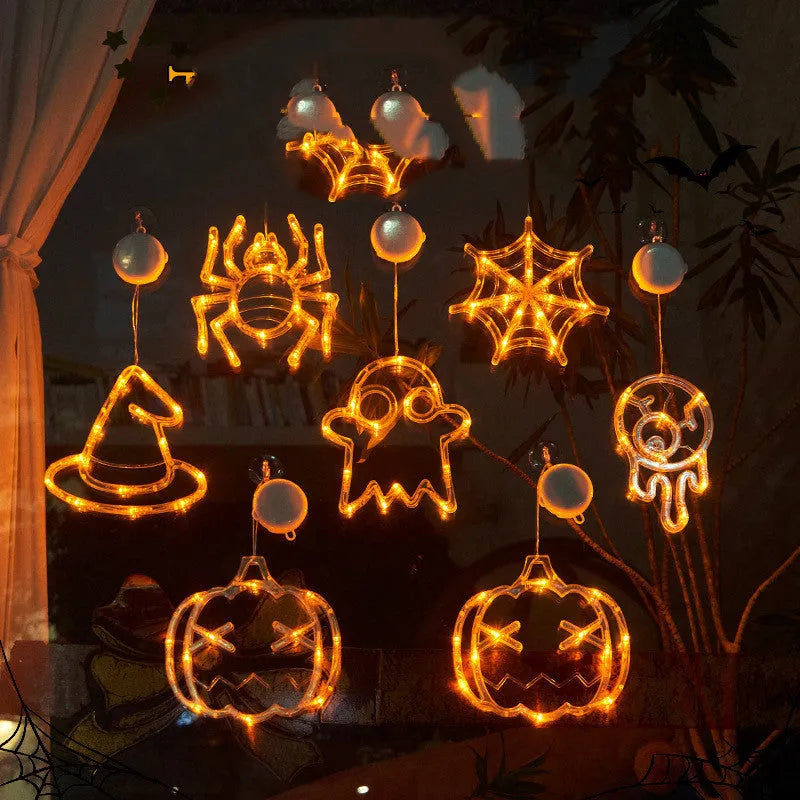 Halloween window hanging LED lights with spider pumpkin ghost designs and suction cup attachment