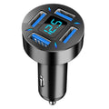 Black four-port USB car charger with LED digital display showing output voltage