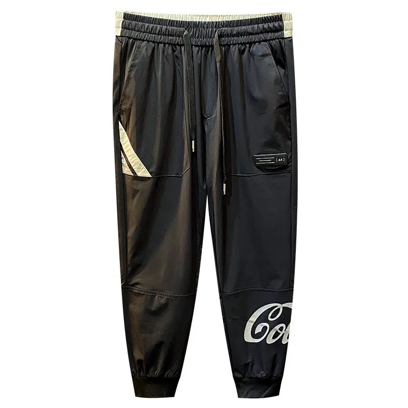 Men's black cropped ankle banded trousers in ultra-thin ice silk cotton fabric