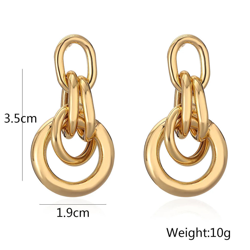 Gold-colour geometric earrings with irregular shapes and INS high-profile design