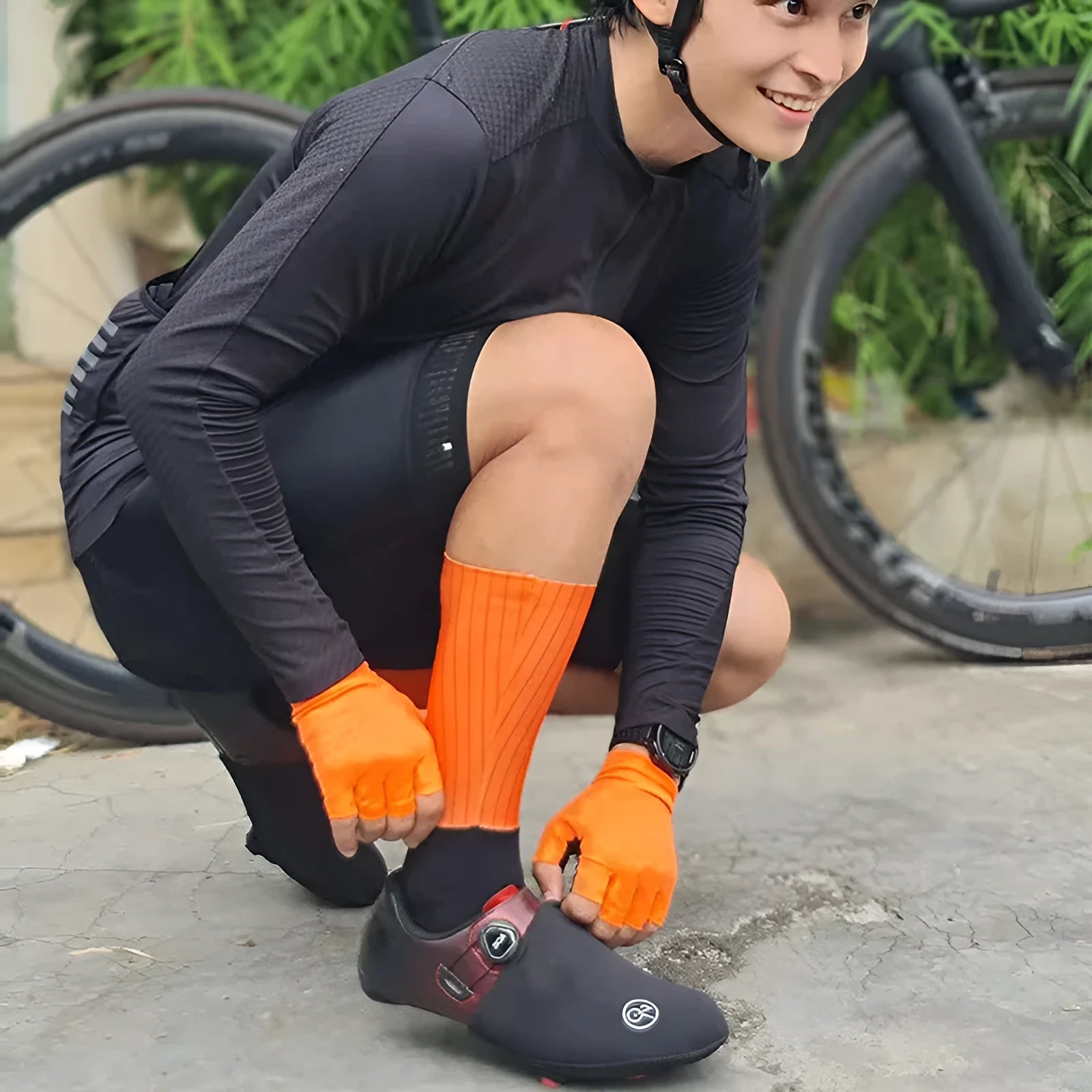 Cycling and running socks in orange colour with moisture-wicking athletic design