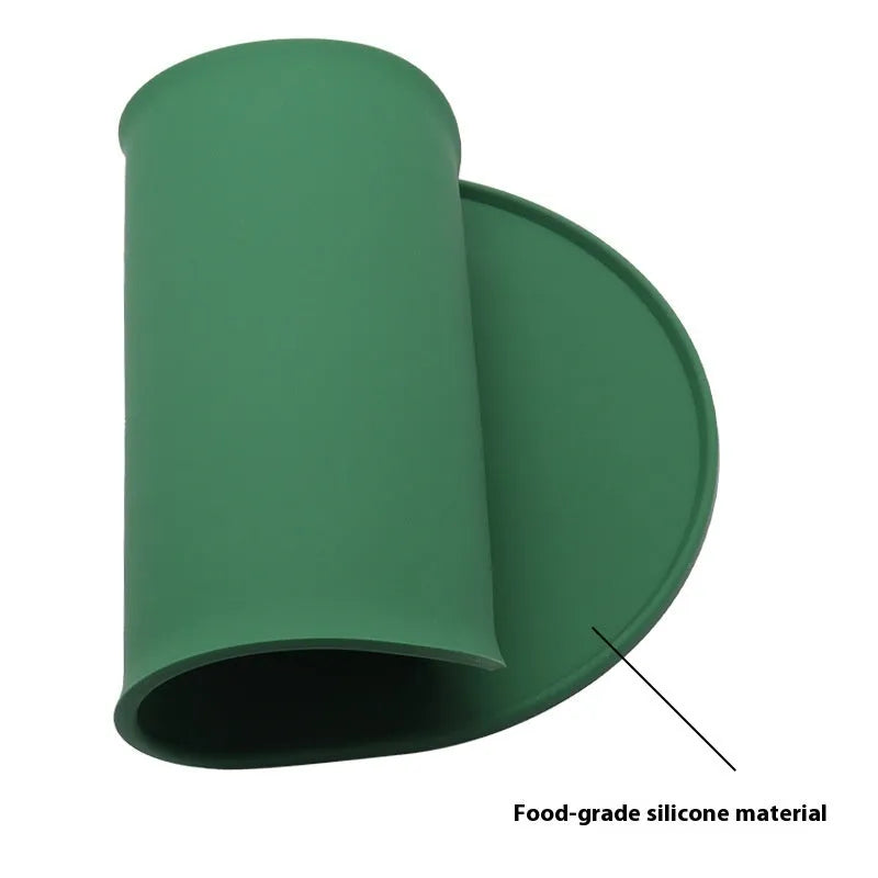 Silicone waterproof placemat for cat food and water bowls in green, beige, black, or purple.
