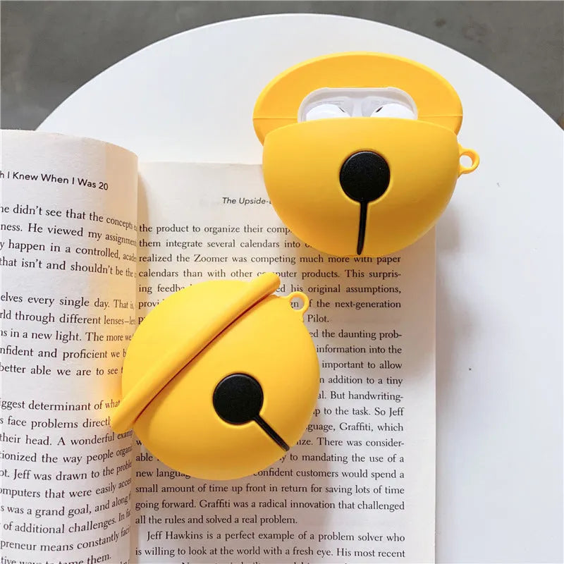 Yellow silicone protective case for AirPods 1 and 2 with an attached carrying strap.