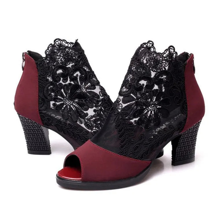 Black lace women's Gladiator sandals with a square high heel and peep toe on a zip closure