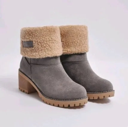 Women's black suede mid-calf snow boots with a round toe and flat low heel.