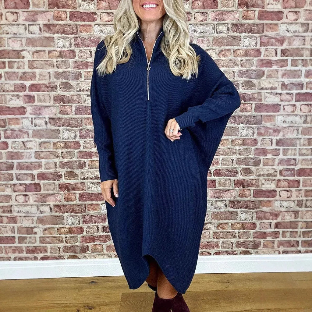 Women's solid colour knitted dress with raglan sleeves and side zipper in polyester fabric.