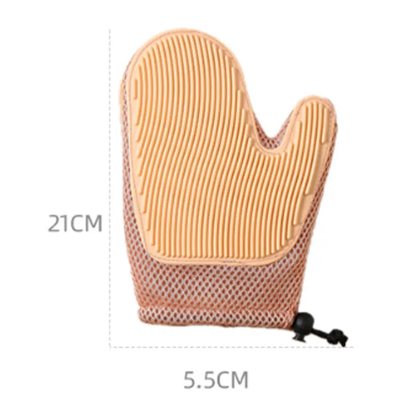 Right hand pet hair remover glove in dark blue, light green, or yellow on a fabric sofa.