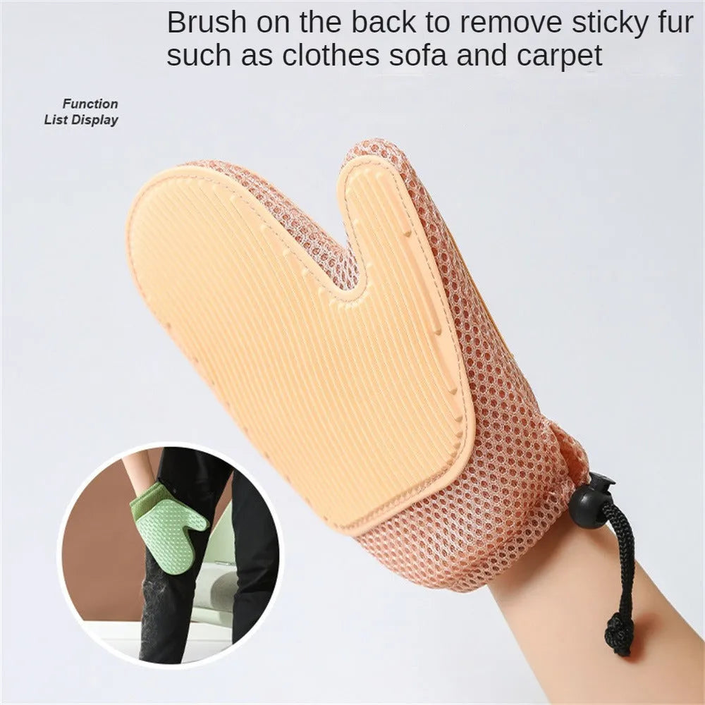 Right hand pet hair remover glove in dark blue, light green, or yellow on a fabric sofa.