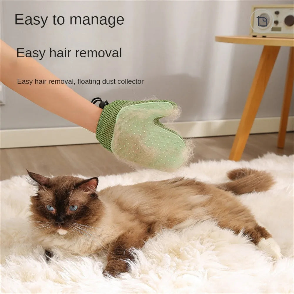 Right hand pet hair remover glove in dark blue, light green, or yellow on a fabric sofa.