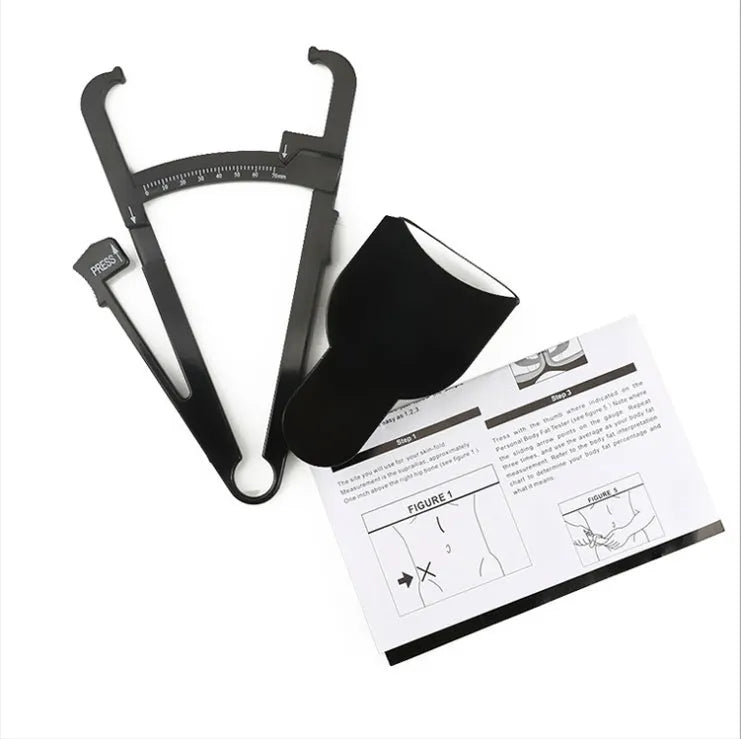 Black ABS plastic body fat caliper skinfold measuring instrument on a tape measure
