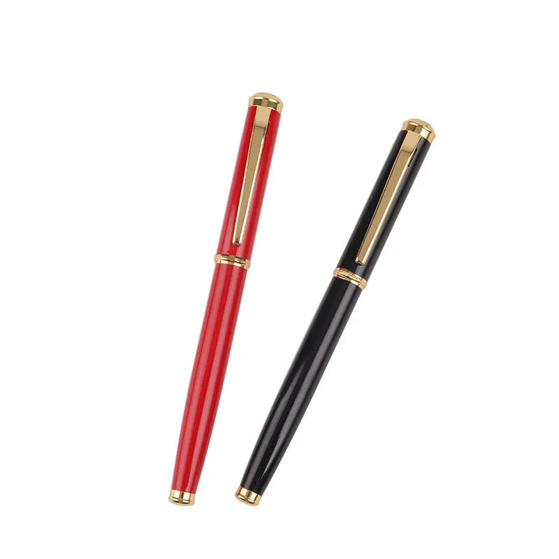 Red and black metal fountain pen with a 0.5mm Yijin nib on a writing surface.