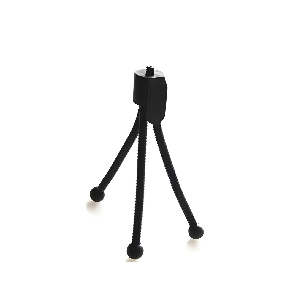 Small silver iron mini tripod with ball head, folded to compact size next to a smartphone.