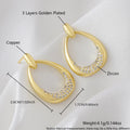 Yellow gold geometric drop earrings with ring design elements measuring 2.6cm