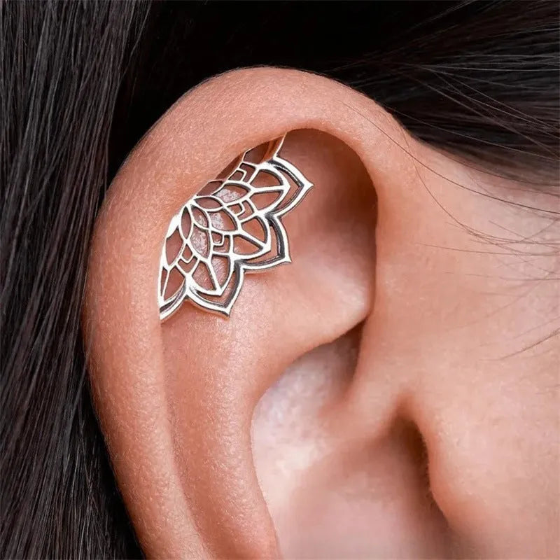 Spider web stud earrings with geometric mesh design in gold and silver electroplated metal