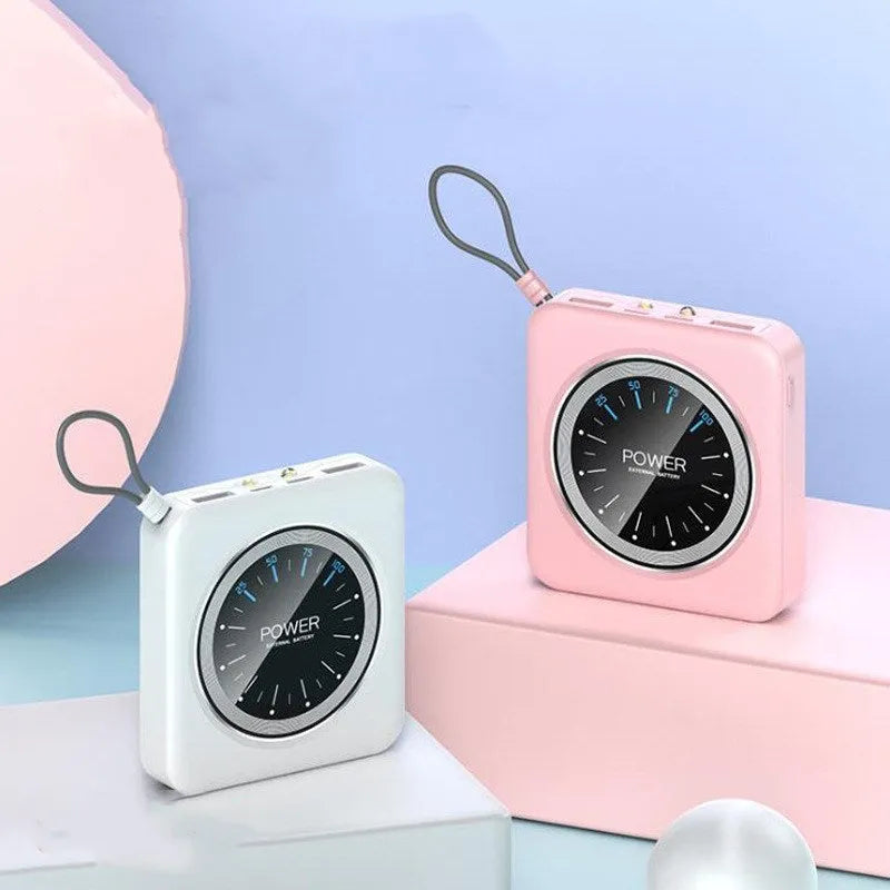 Mini clock charger portable power bank in mint green colour showing compact design with USB ports