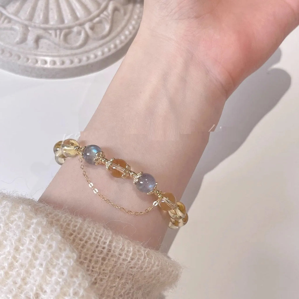 Chinese style crystal bracelet with 14K gold electroplated finish and diamond-shaped design