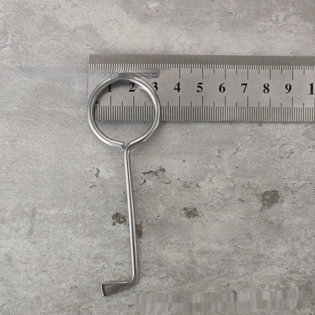 Two alloy wrench tools from a portable family maintenance set on a plain background.
