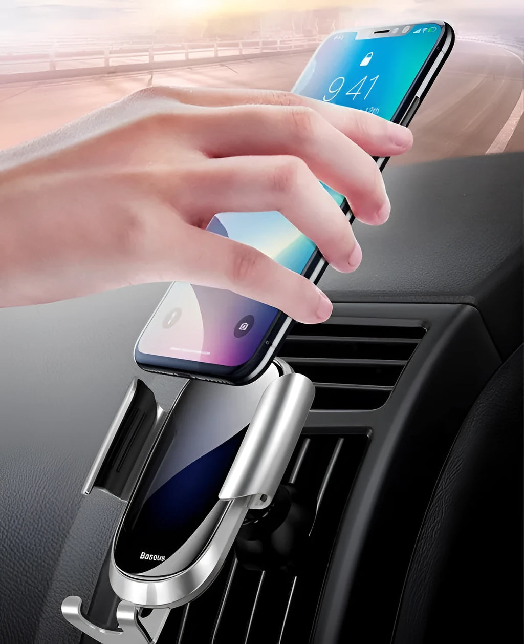Universal car phone bracket in black, blue, and silvery colours mounted on a car dashboard