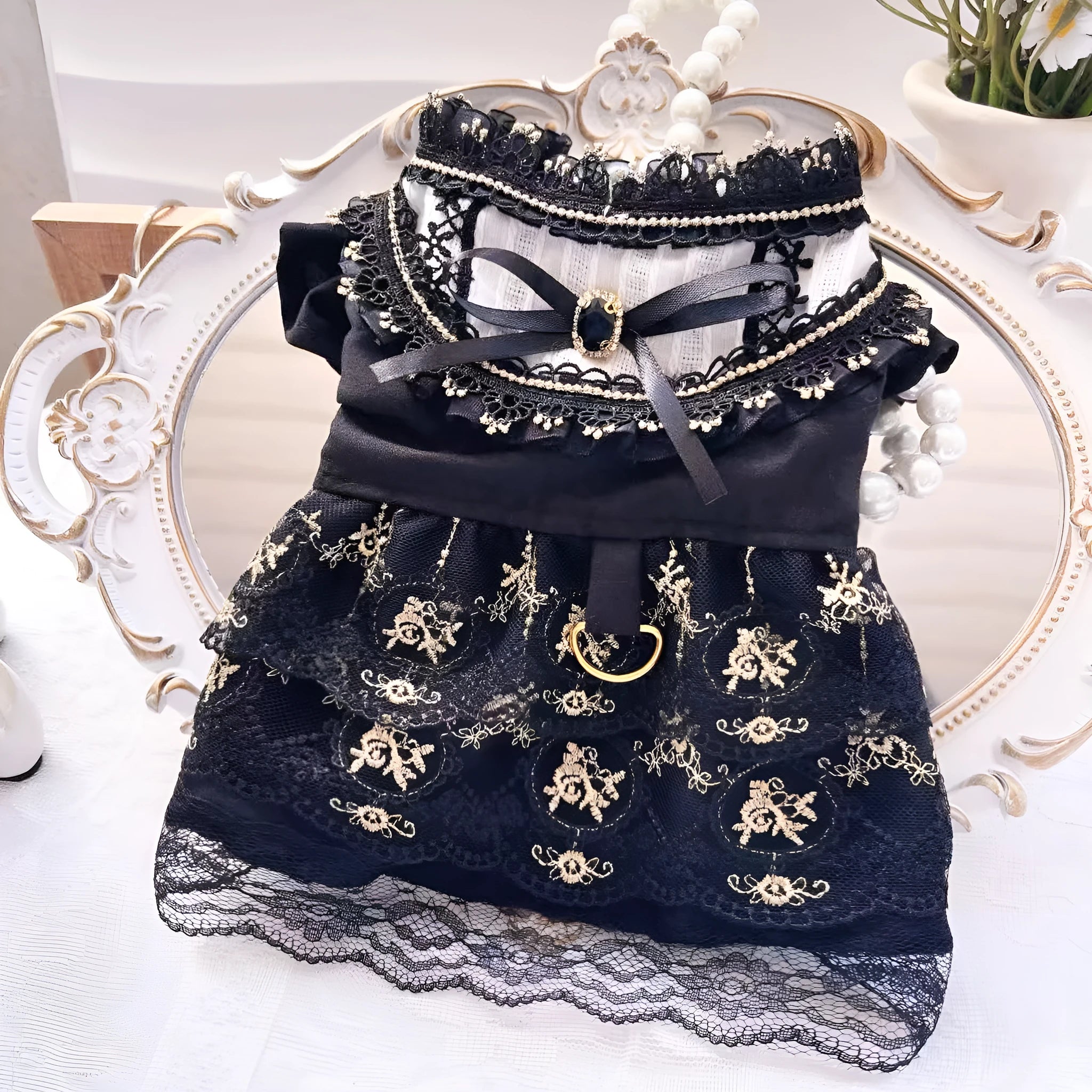Golden Gothic-style princess skirt costume for a small dog or cat on a mannequin.
