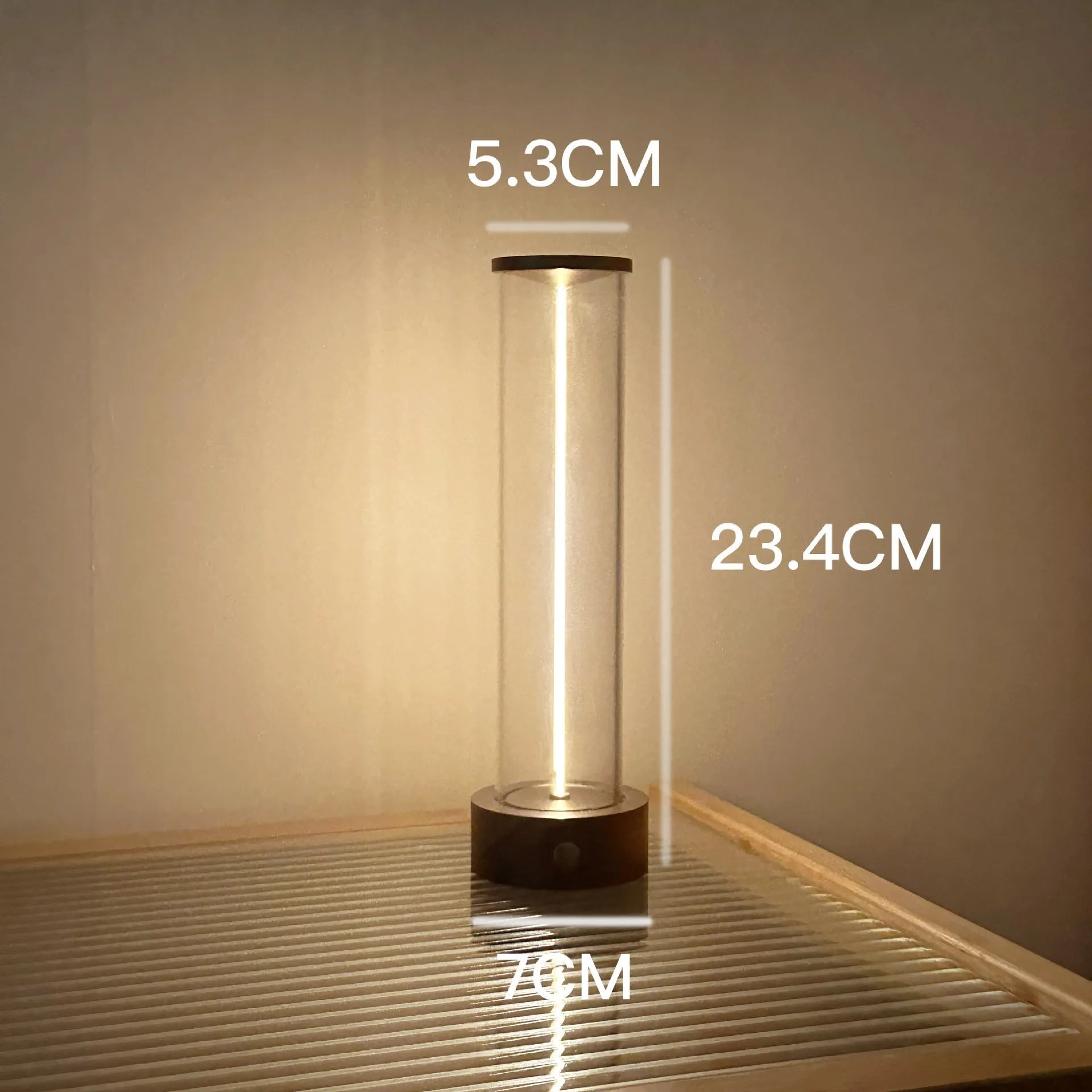 Modern rectangular LED light strip with frosted glass panel, shown with USB cable for charging.