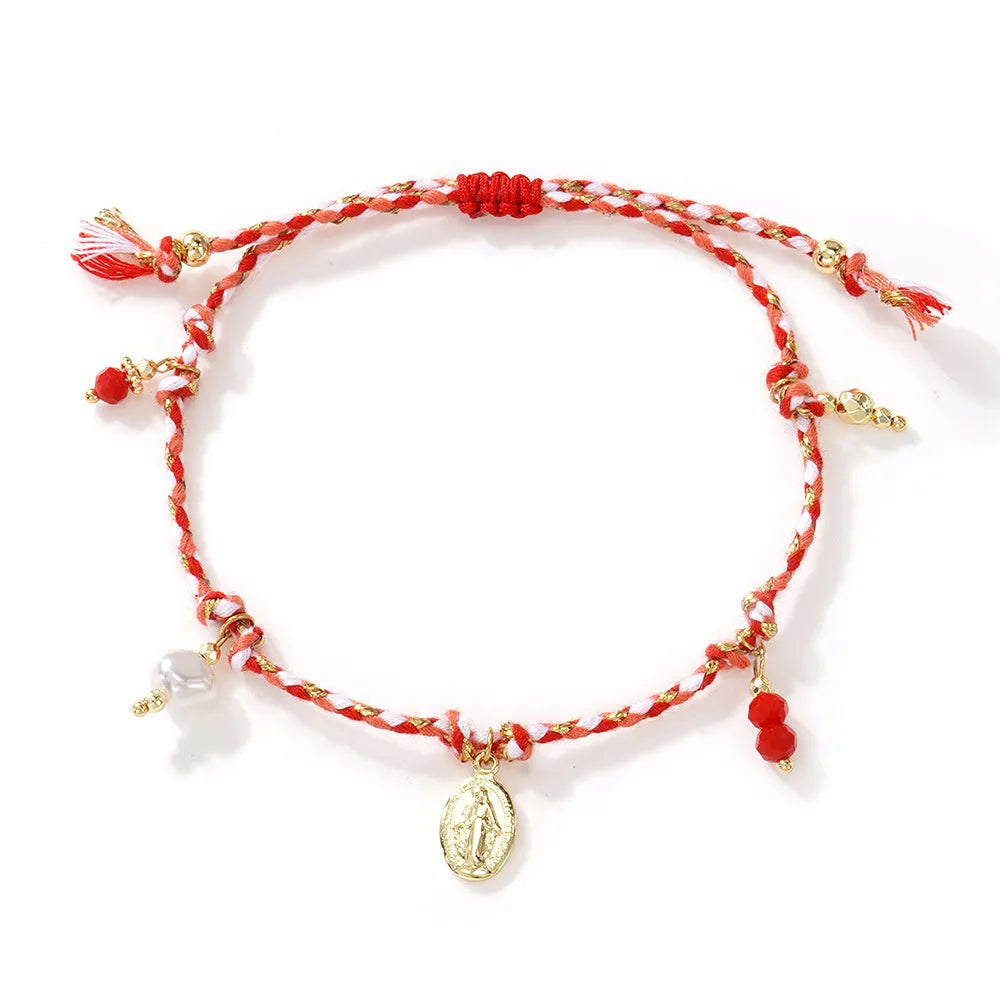 Close-up of a hand-woven colourful braided rope bracelet for women featuring an adjustable carrying strap tag closure.