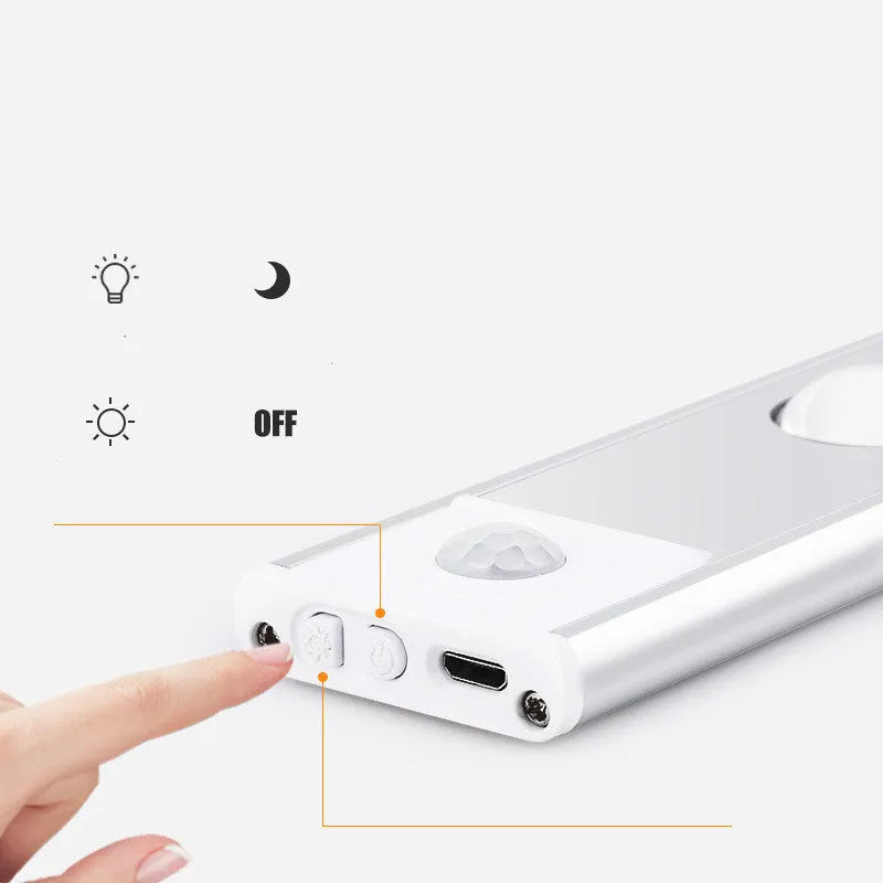 Rechargeable hill corrugated LED light strip in black or silver with magnetic mount on a wall.