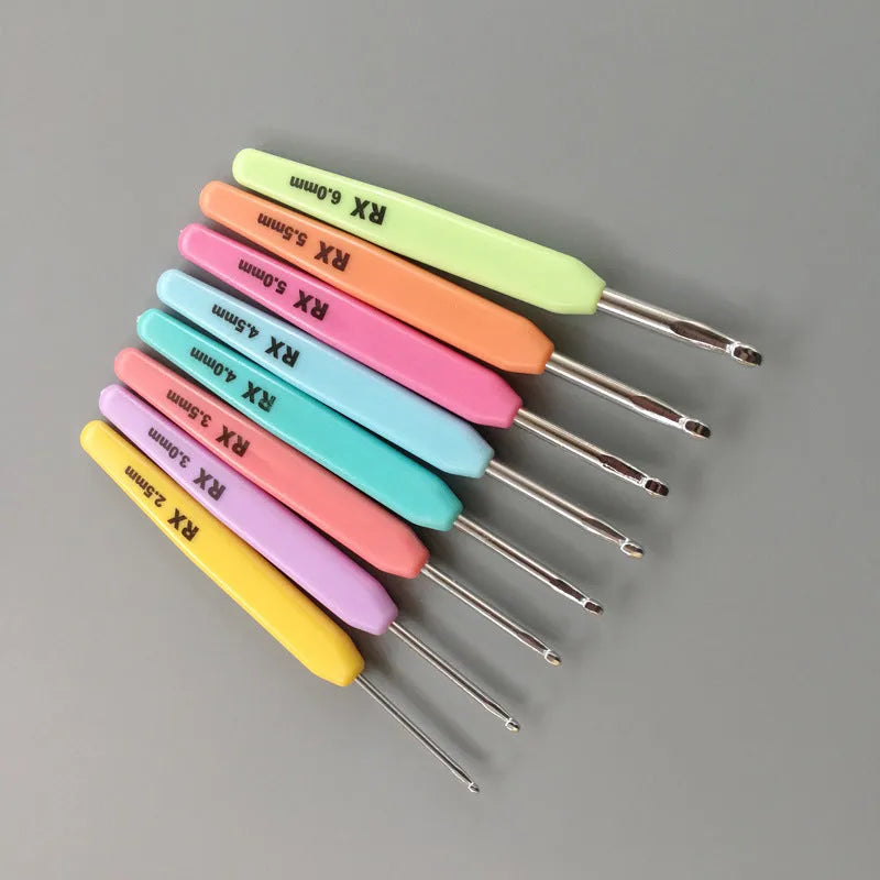 Set of 16 crochet hooks with different sized heads in a PU storage bag