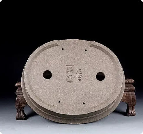 Handmade antique oval purple sand ceramic bonsai pot measuring 25cm long by 21cm wide by 6.3cm high