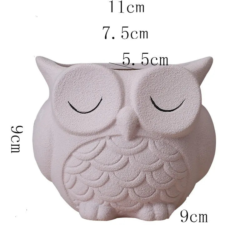 Handmade frosted ceramic flower pot with cartoon owl design for succulents.