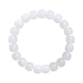 White Hetian jade barrel bead bracelet on a wrist, showing unisex casual style