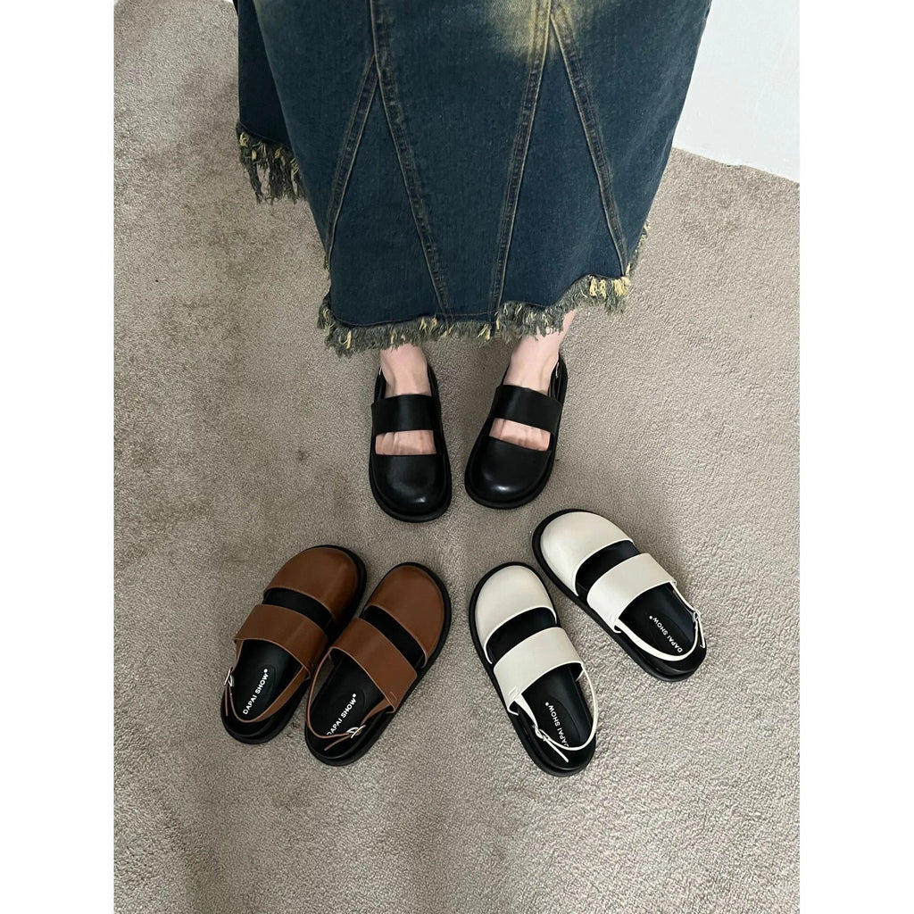 Women's retro apricot closed-toe sandals with an ankle strap buckle on a microfiber upper.